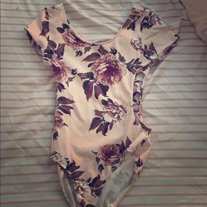 Floral body suit with side cut outs